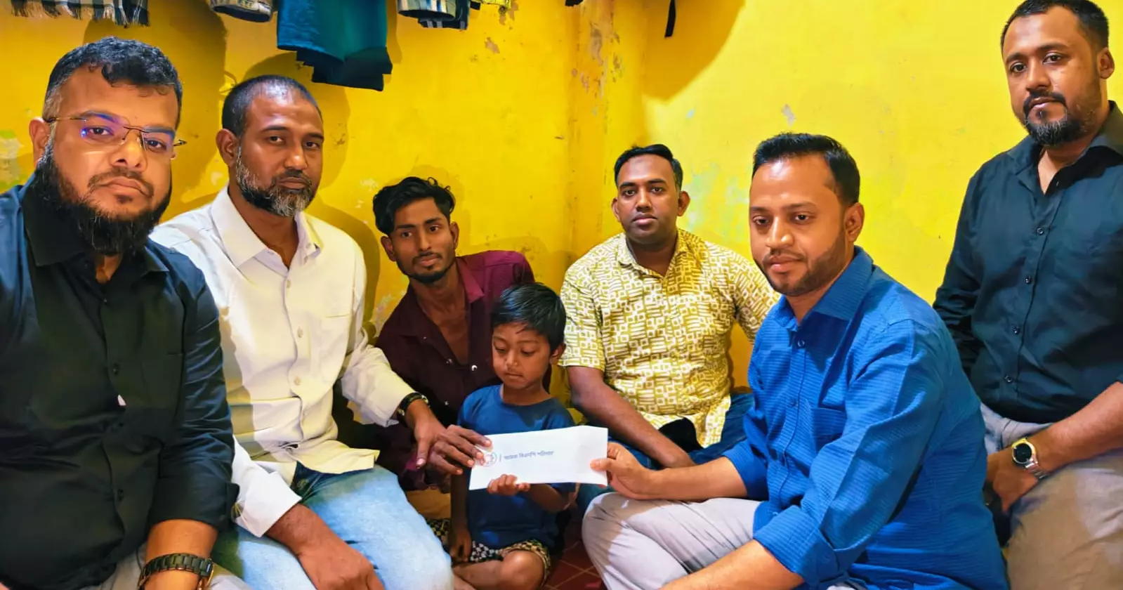 PM stands by child Ratul, elderly water vendor Shahanur