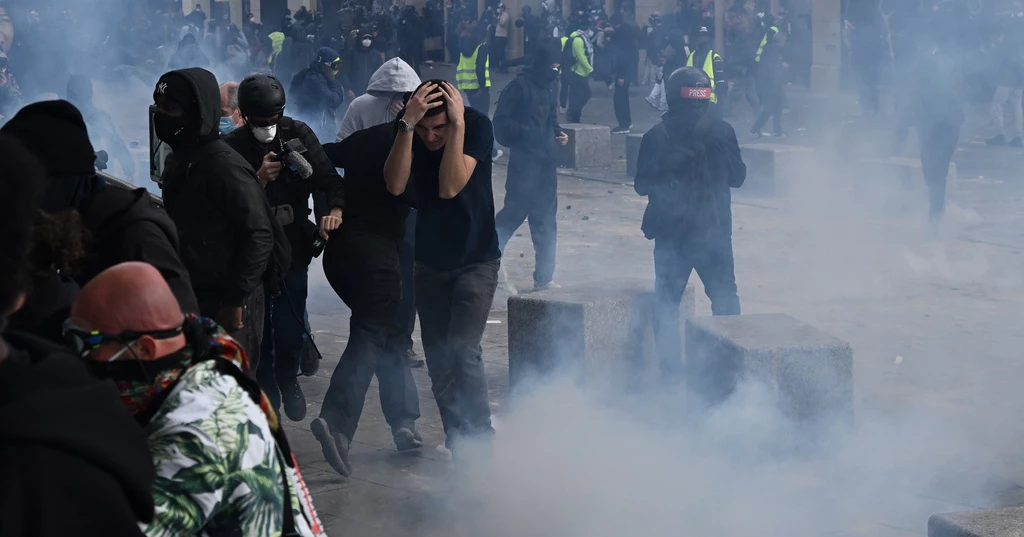 Fires, clashes erupt as protesters rally across France over living costs
