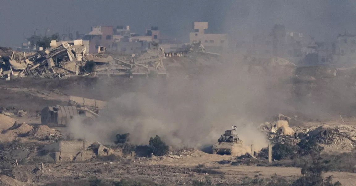 Strikes across Gaza kill at least 31 as scholars accuse Israel of genocide