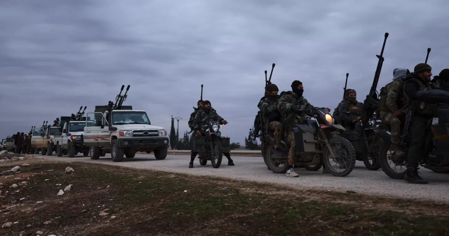 Syrian troops move into northern towns after Kurdish fighters pull back