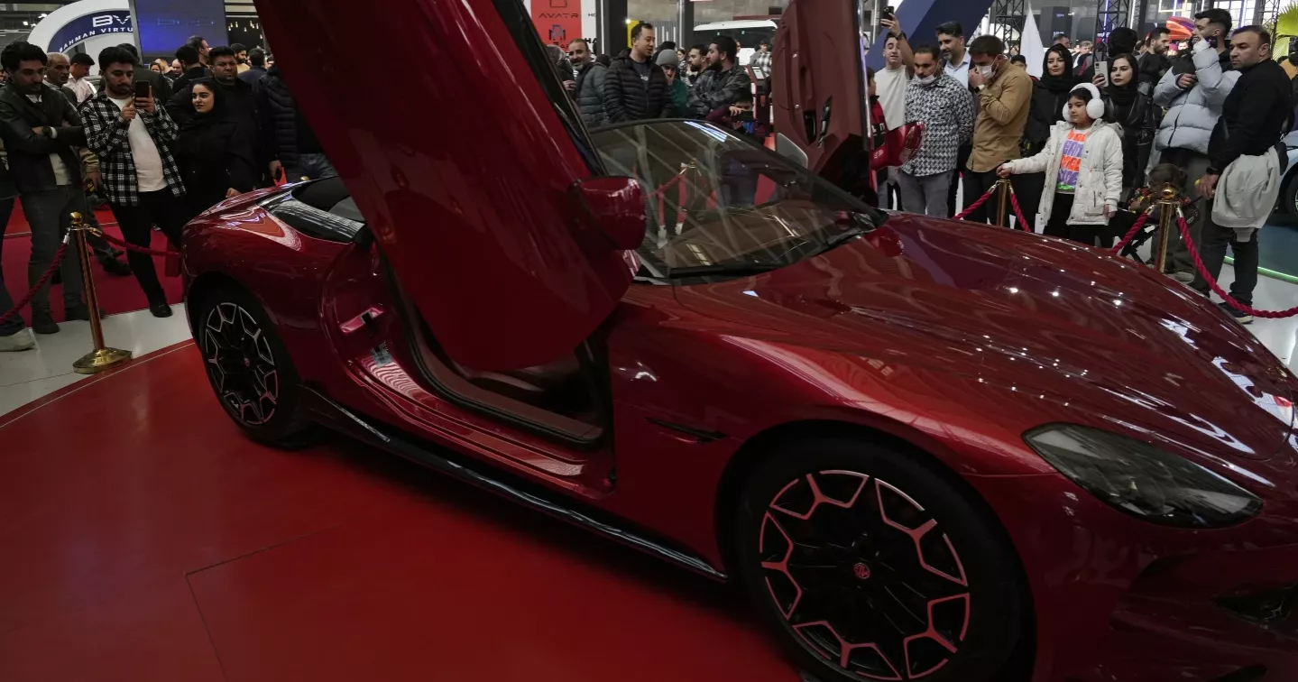 Iran loosens import restrictions on foreign cars and iPhones, trying to mask its economic woes