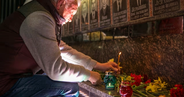 Ukrainian city marks chernobyl anniversary with midnight vigil despite war
