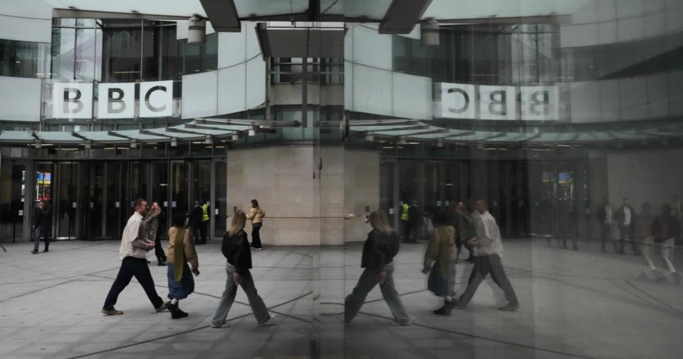 BBC leaders grilled by lawmakers over its standards after Trump threatened to sue