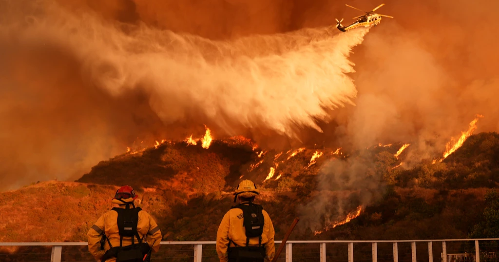 LA wildfire death toll rises as crews fight strong winds to protect homes, landmarks