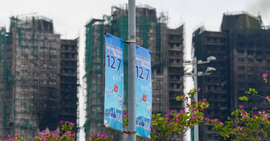 Hong Kong election under pressure after deadly fire