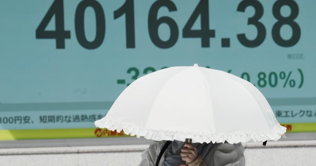 Asian shares are mostly higher, tracking US rally into record heights
