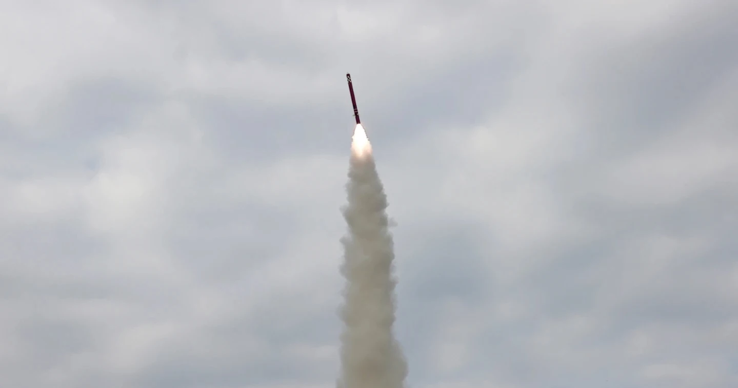 North Korea hails cruise missile tests as Trump arrives in South Korea