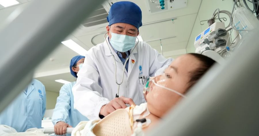 Chinese doctors implant world's smallest artificial heart in 7-year-old boy