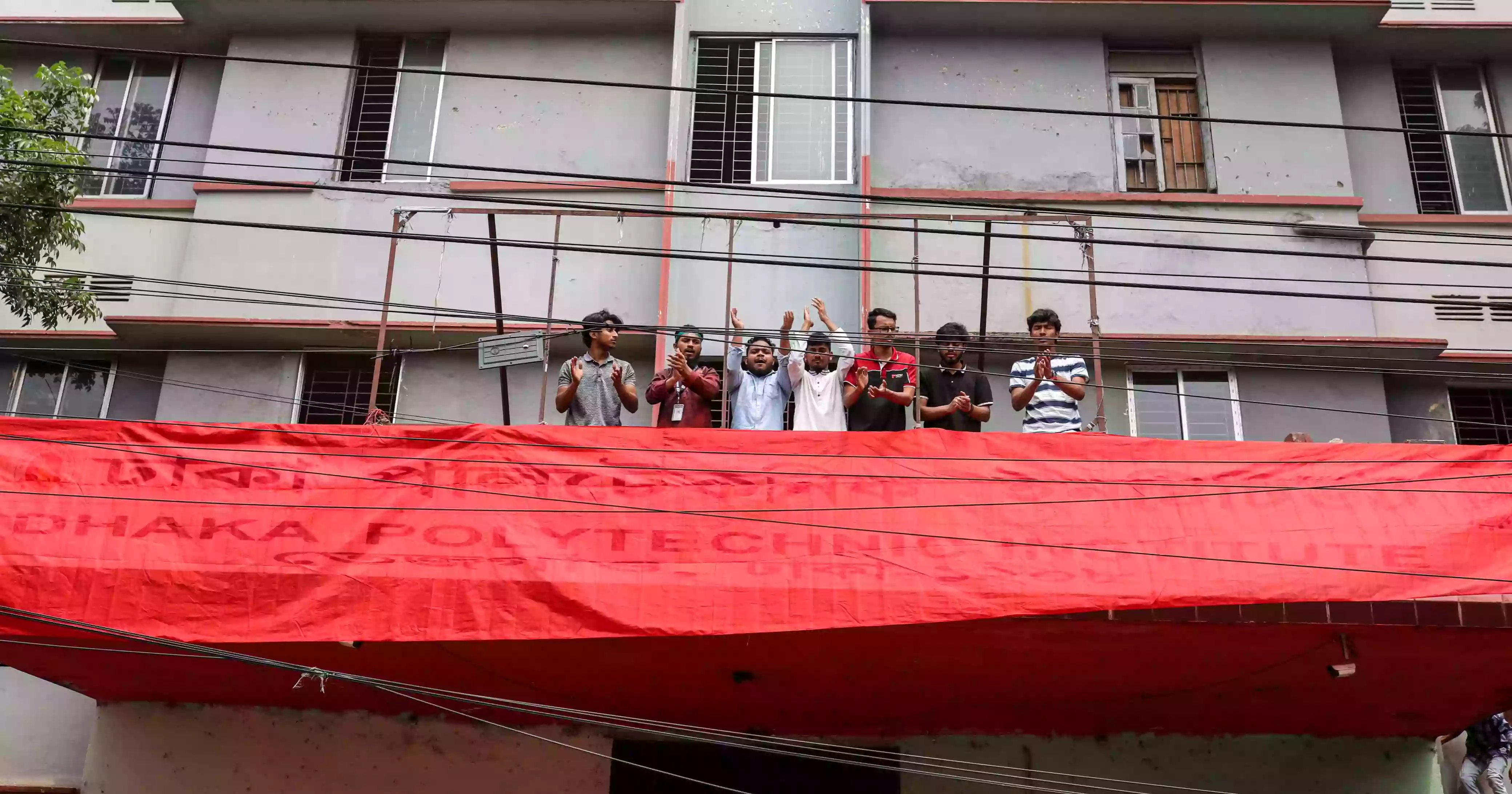 Dhaka Polytechnic Institute’s nameplate covered in red cloth amid student protests