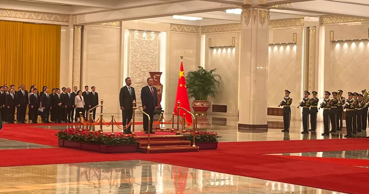 PM receives red-carpet reception at Great Hall of the People in Beijing