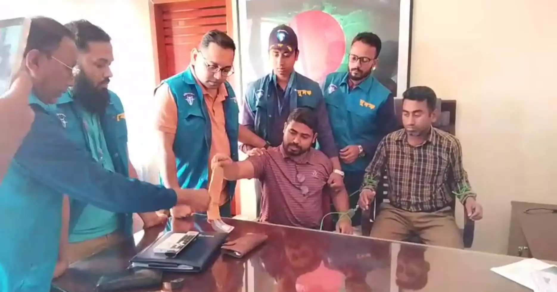 Sonagazi project officer detained with bribe