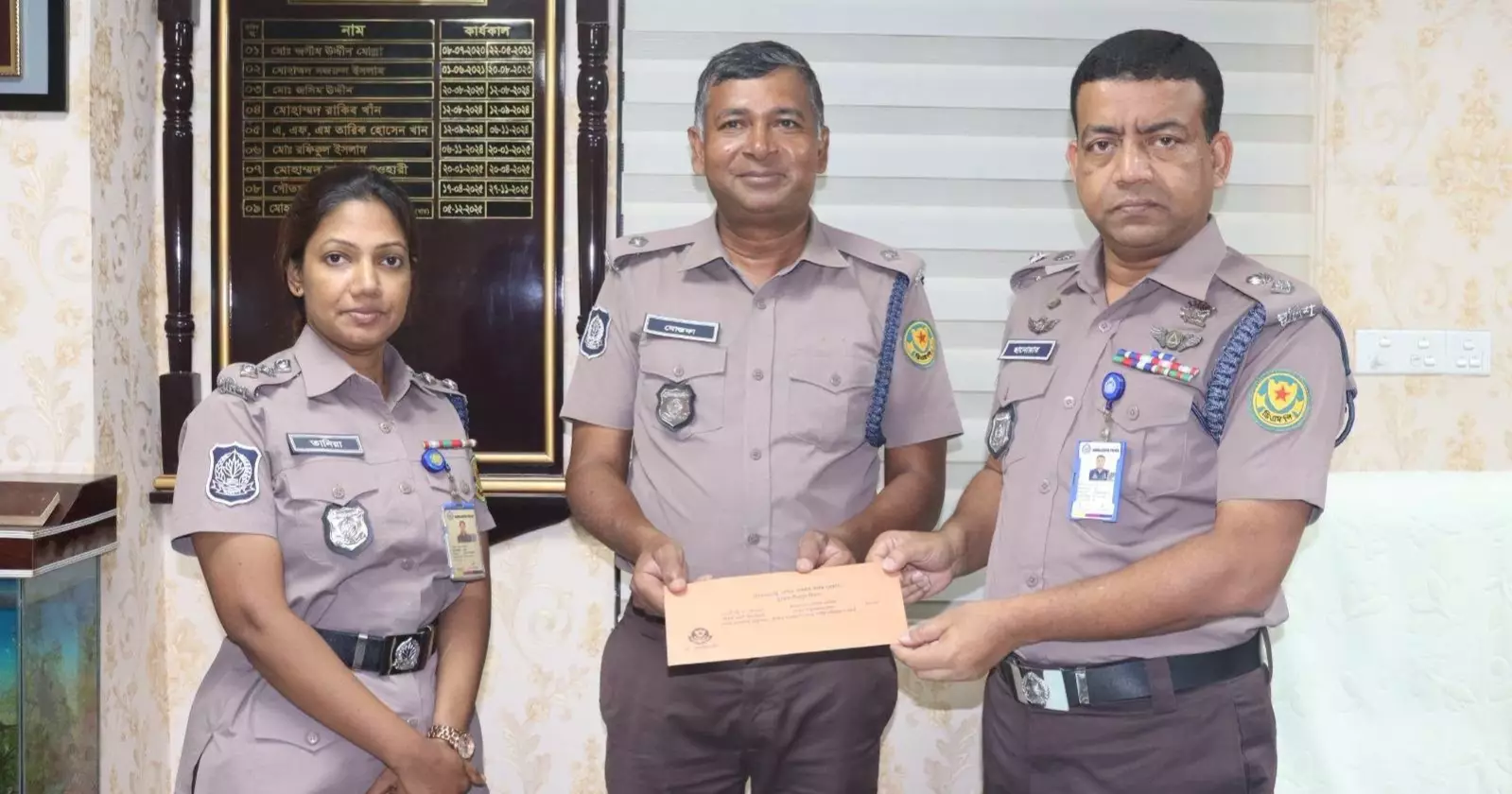 Inspector Golam Mostafa receives bravery award for recovering hijacked livestock truck