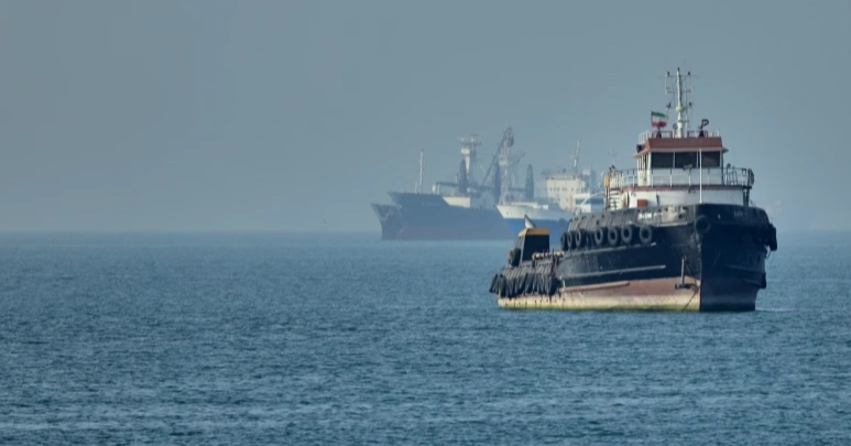 Iran warns the US against attacks on its vessels as fragile ceasefire holds