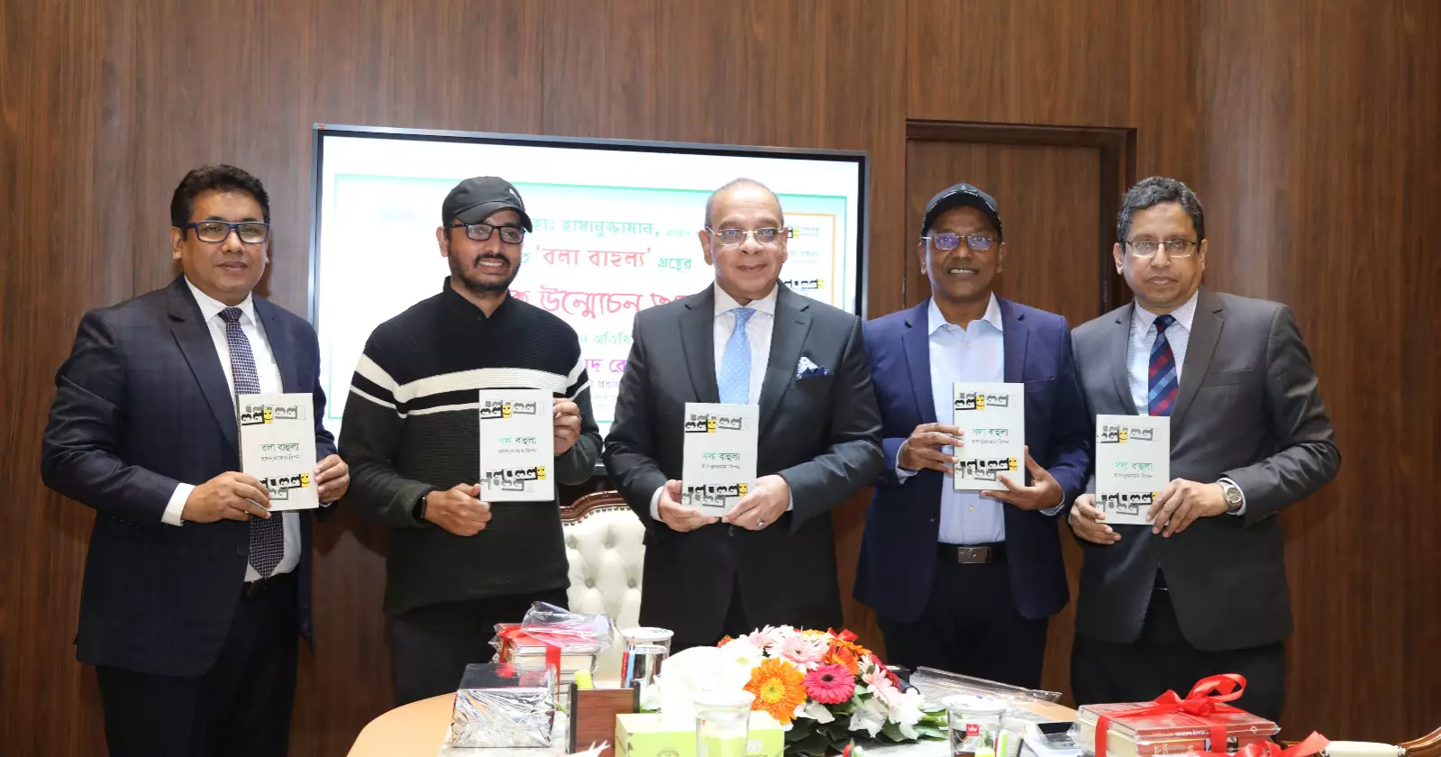 Chief Justice unveils ‘Bola Bahulya’ book written by Registrar Hasanuzzaman