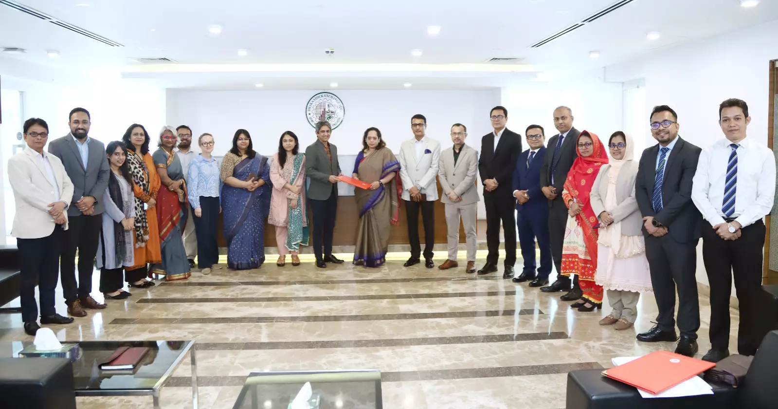DSE, Swisscontact sign MoU to strengthen SME participation in capital market
