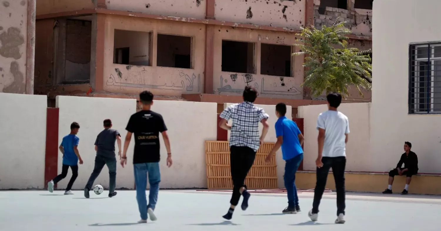 Syrian children return to shattered classrooms as war-scarred schools reopen