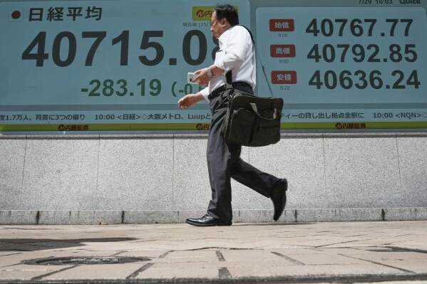 Asian shares mostly rise as Wall Street stocks continue to decline