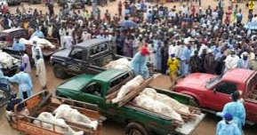 Boko Haram militants on motorcycles attacked a Nigerian village, killing over 100, residents say