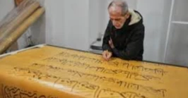 Iraqi calligrapher completes massive handwritten Quran after six years