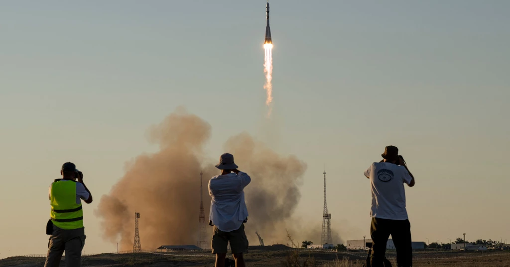US-Russian crew reaches International Space Station for eight-month mission