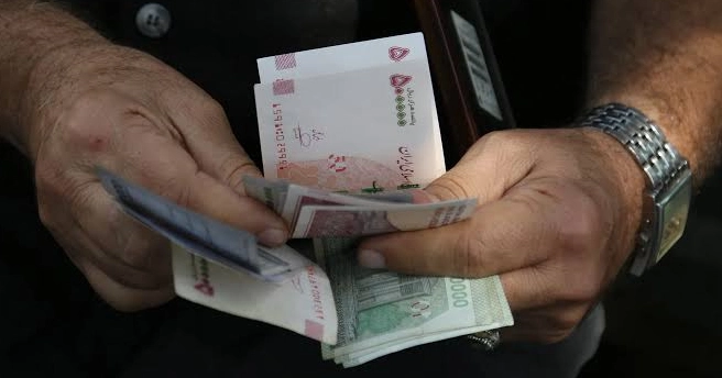Iran’s currency hits record low as war weighs on economy