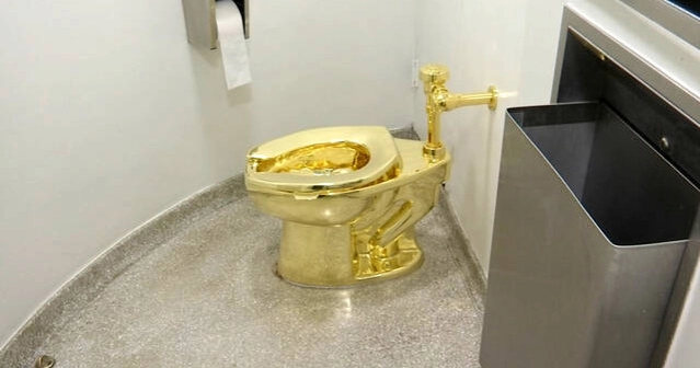 Flush with cash: solid gold toilet fetches $12.1M at auction