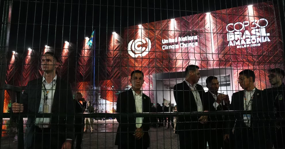 Protesters clash with security at main UN climate summit venue in Brazil