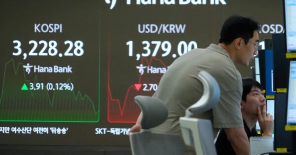 Asian shares mixed as hopes for US rate cuts wane; Bitcoin hits record