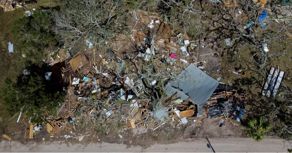 At least 64 dead and millions without power after Helene's deadly march ...