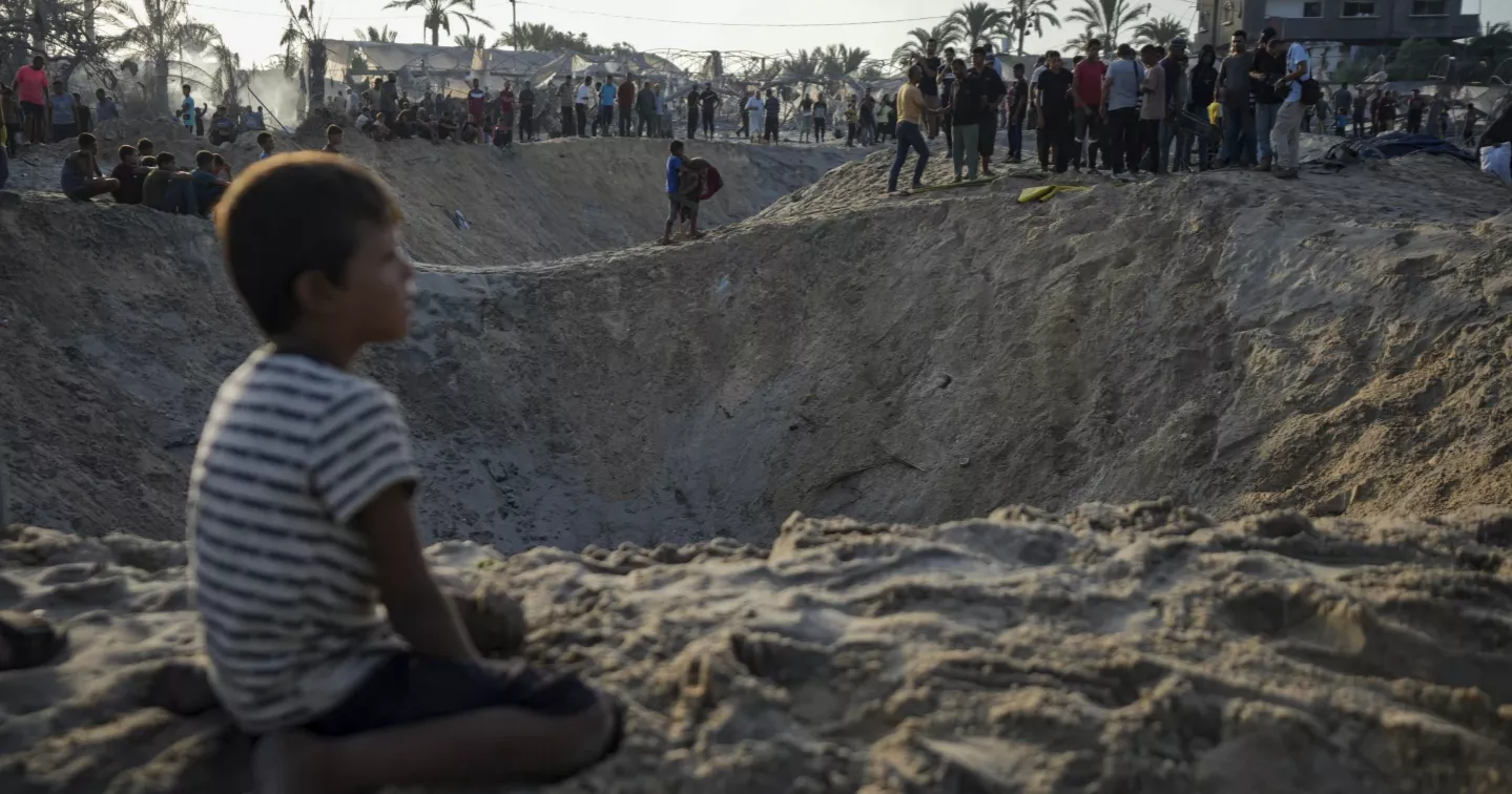 An Israeli strike on a Palestinian tent camp kills at least 19