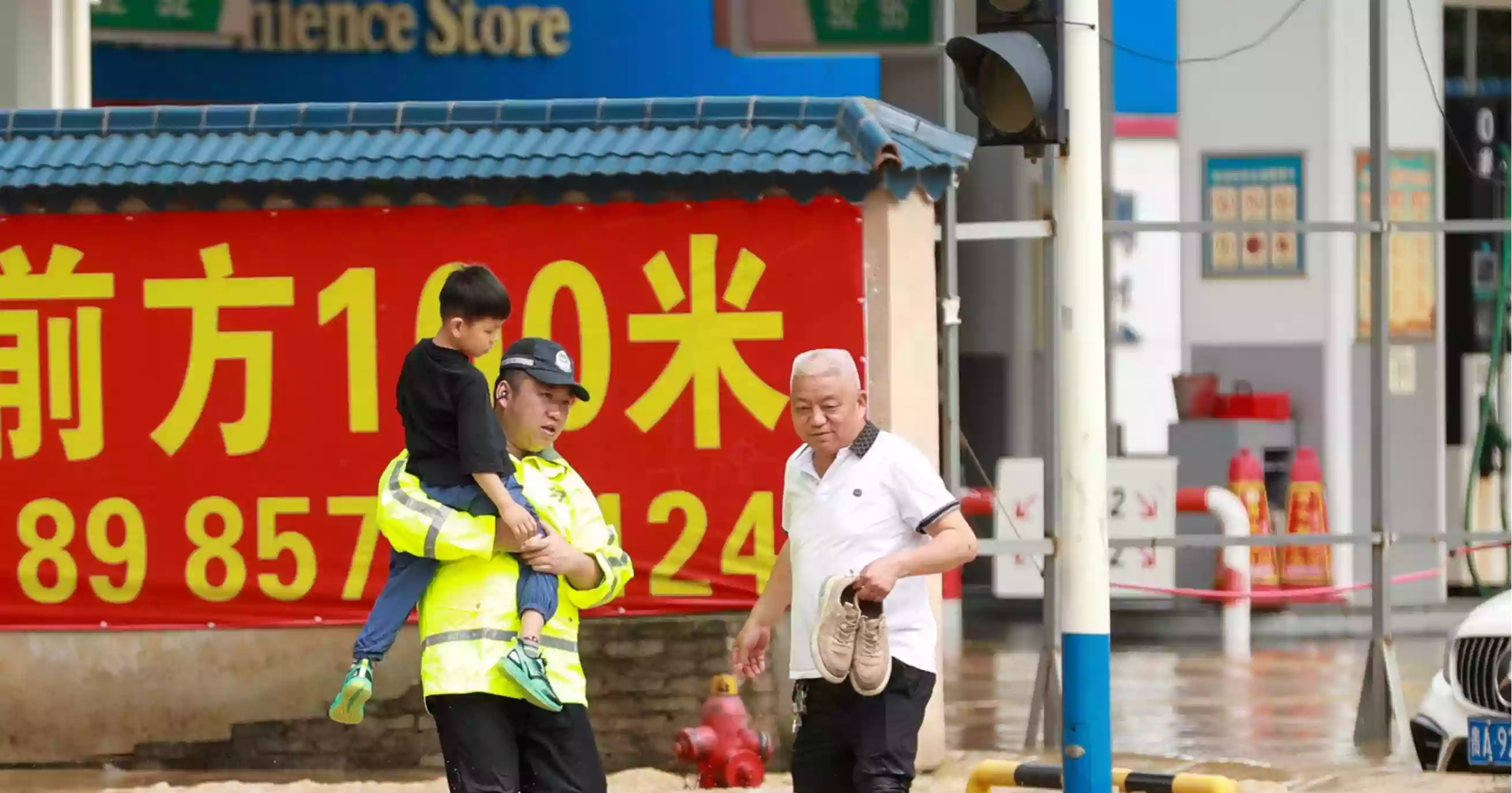 Heavy rain and floods kill at least 12 in China, force thousands to evacuate
