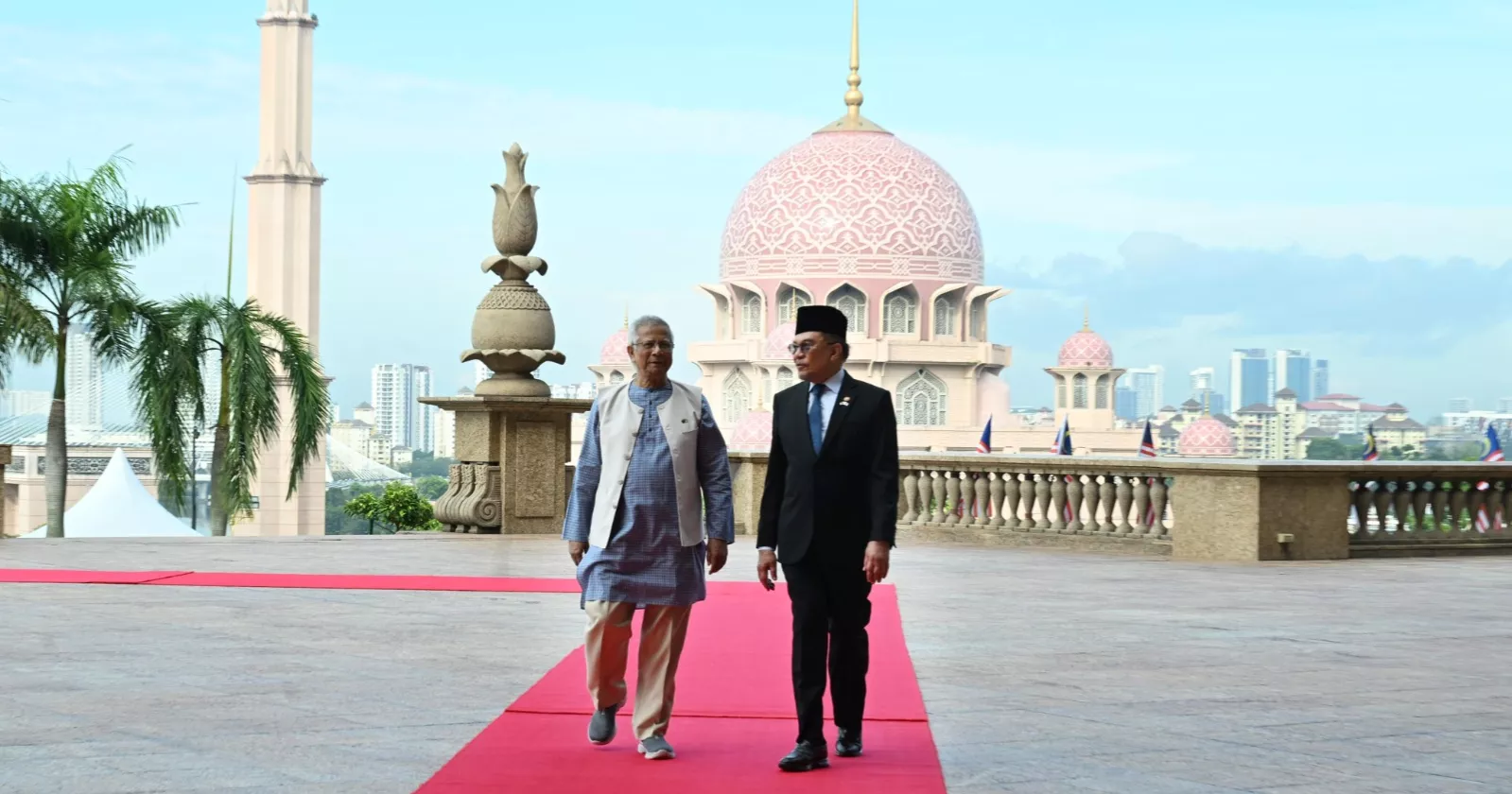 Malaysian PM Anwar Ibrahim receives Prof Yunus at Putrajaya as red carpet rolls out