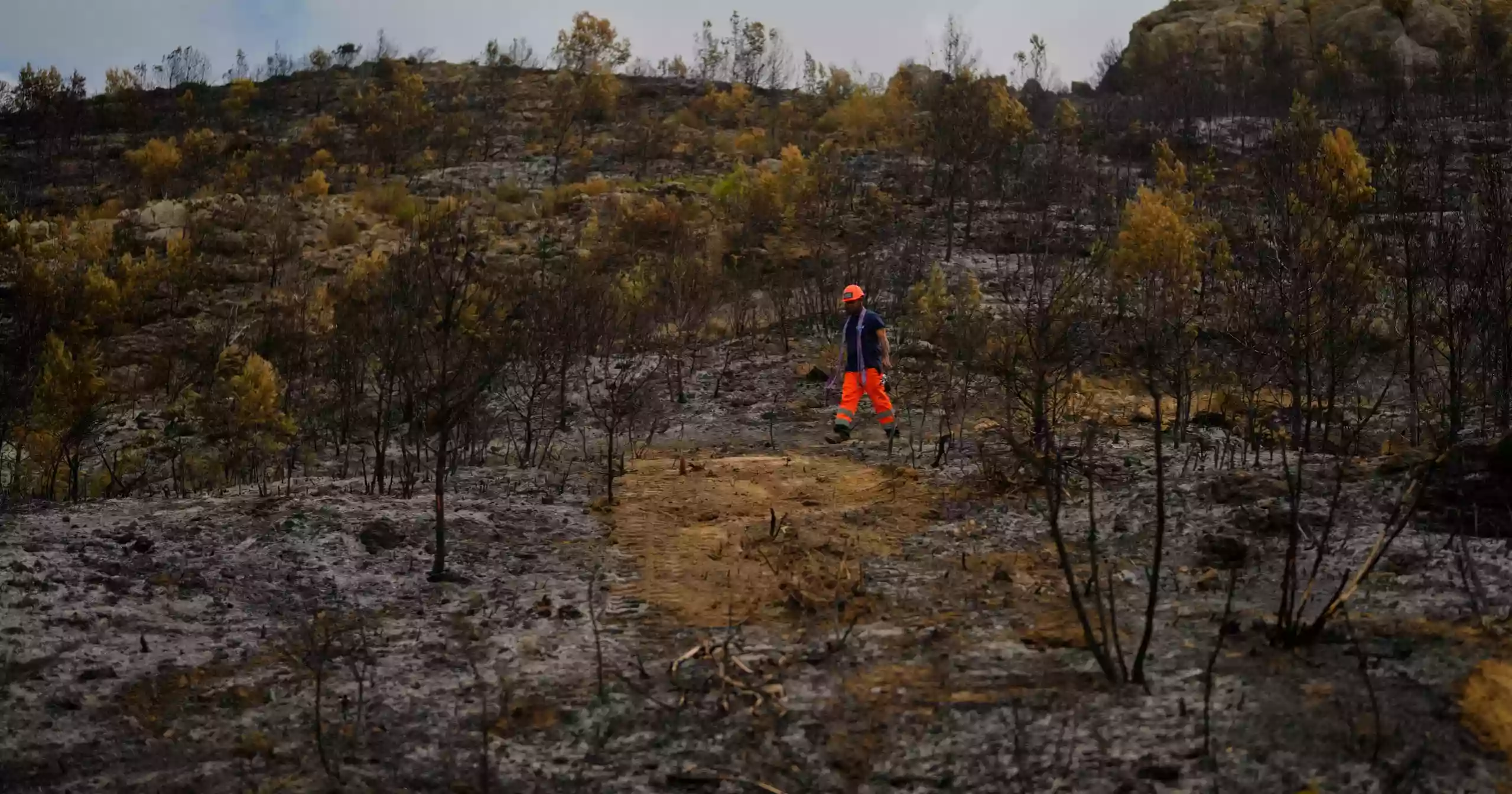 Firefighters work to prevent France’s largest wildfire from reigniting as residents return home