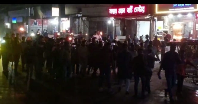 Torch procession held in Gazipur to protest attack on Hasnat Abdullah