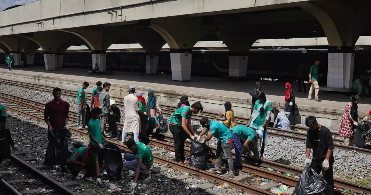 Young volunteers clean up waste from Kamalapur railway track