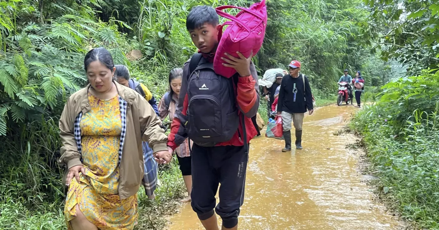 Death toll in deadly flooding and landslides in Indonesia rises to 21