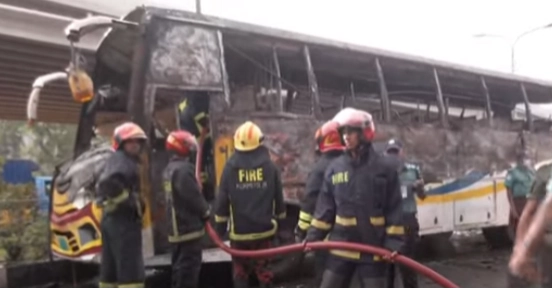 Bus catches fire in front of naval headquarters in city's Banani