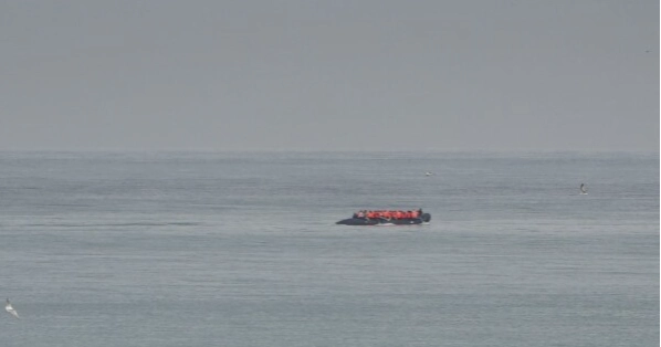 Migrant boat seen trying to make an apparent crossing of English Channel a day after 12 people died