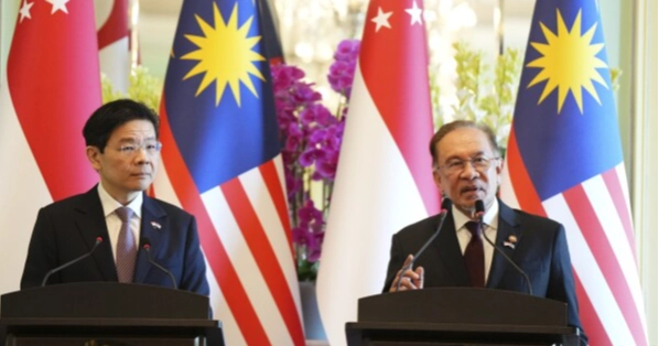 Malaysia and Singapore agree to launch a special economic zone in a rare move to attract investors