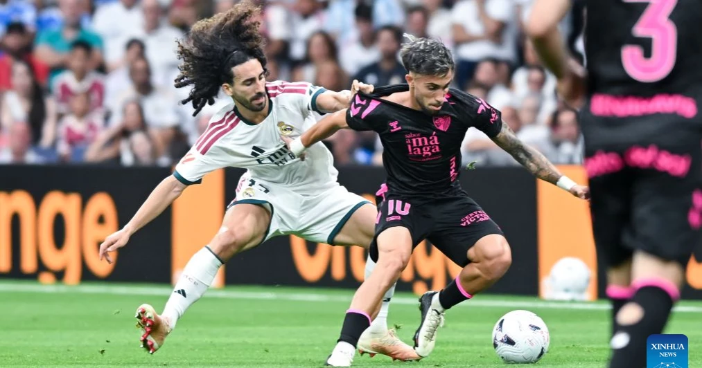 Real Madrid thrash Malaga 4-0 to maintain perfect start