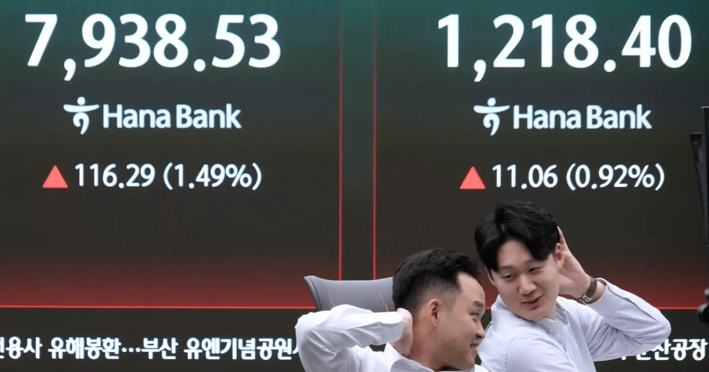 Asian shares mixed as Wall Street hits record highs amid Iran conflict concerns