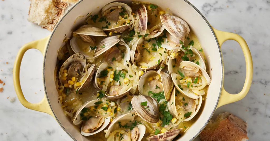 Crème fraîche creates a creamy broth in this recipe for briny-sweet steamed clams