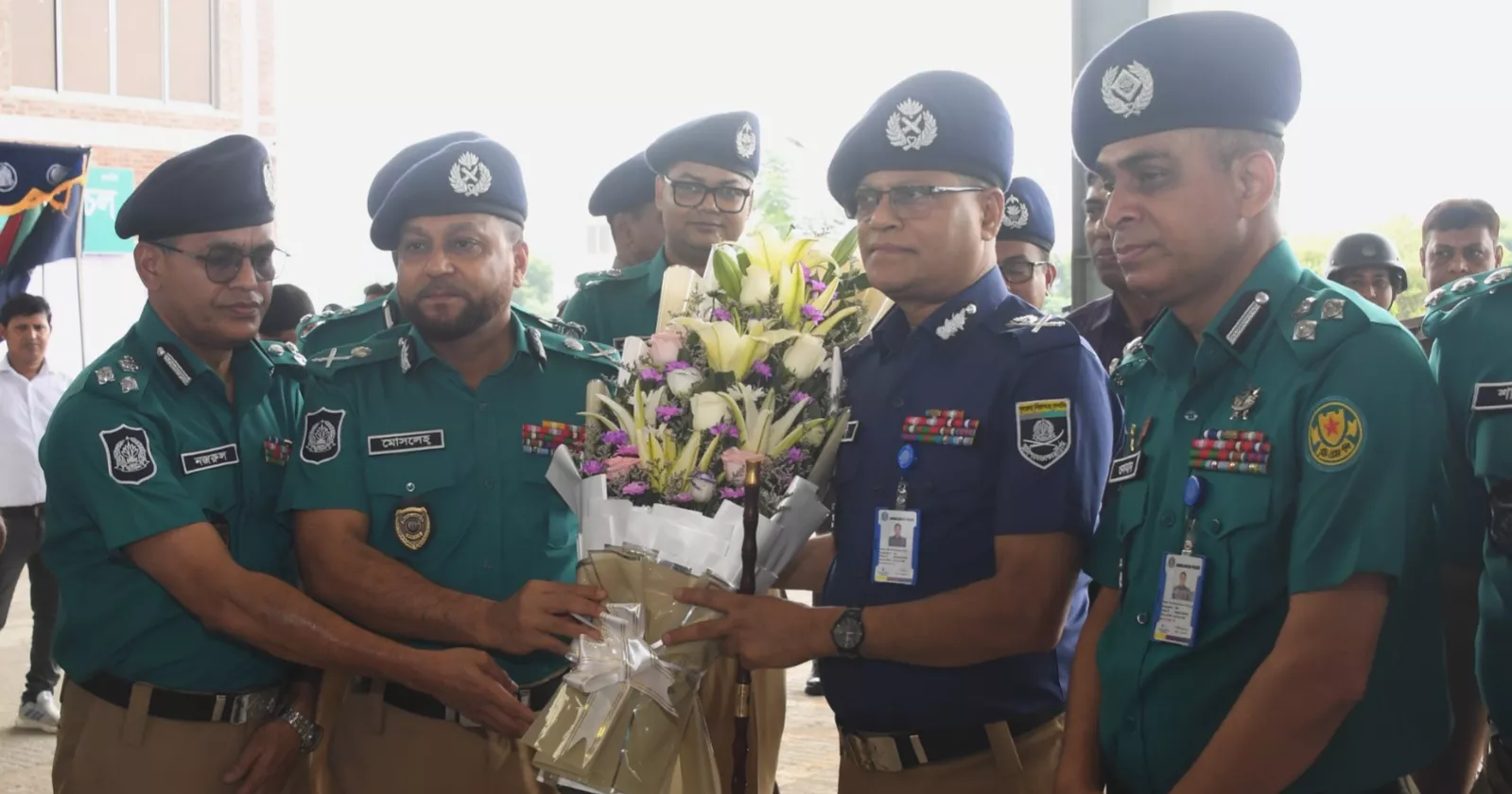 Police begin wearing new uniforms featuring dark blue and olive shirts