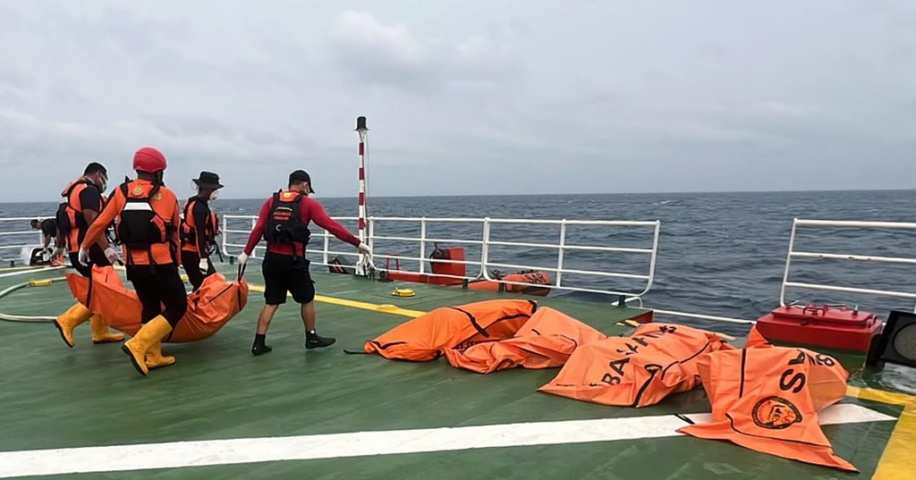 Divers recover 52 bodies from capsized Indonesian ferry after dayslong search