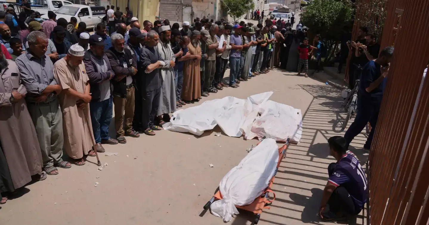 Israeli forces open fire a kilometer away from Gaza aid site, killing 3, health officials say