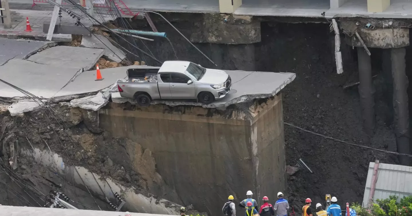 Road collapse in Bangkok creates massive sinkhole, disrupts traffic