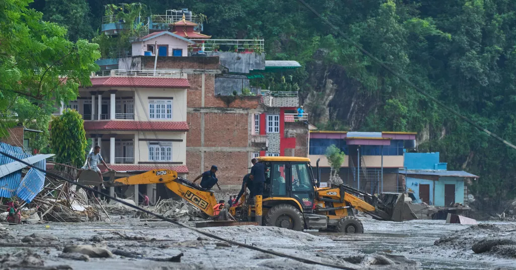 98 killed, hundreds missing after flash floods in Nepal and China