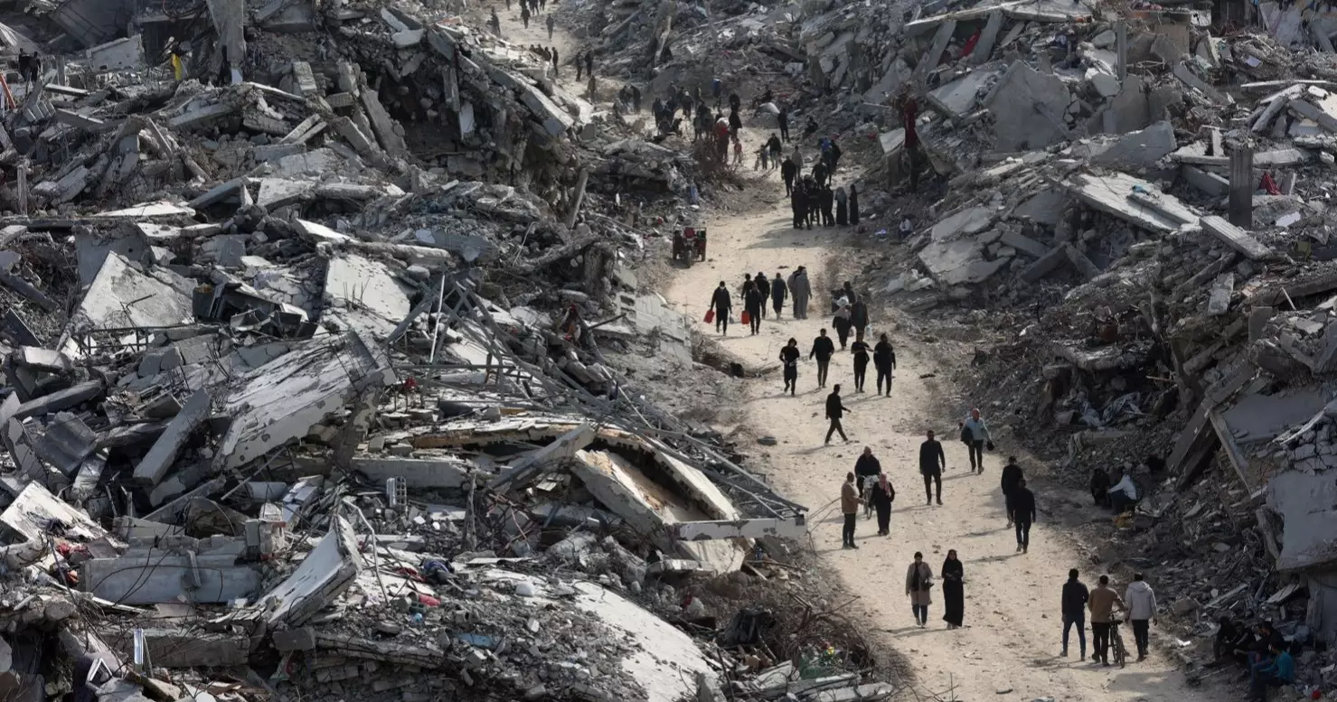 Palestinians return home as aid convoys begin entering Gaza under ceasefire