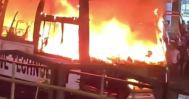 Private university bus set on fire in front of Labaid Hospital in Dhanmondi