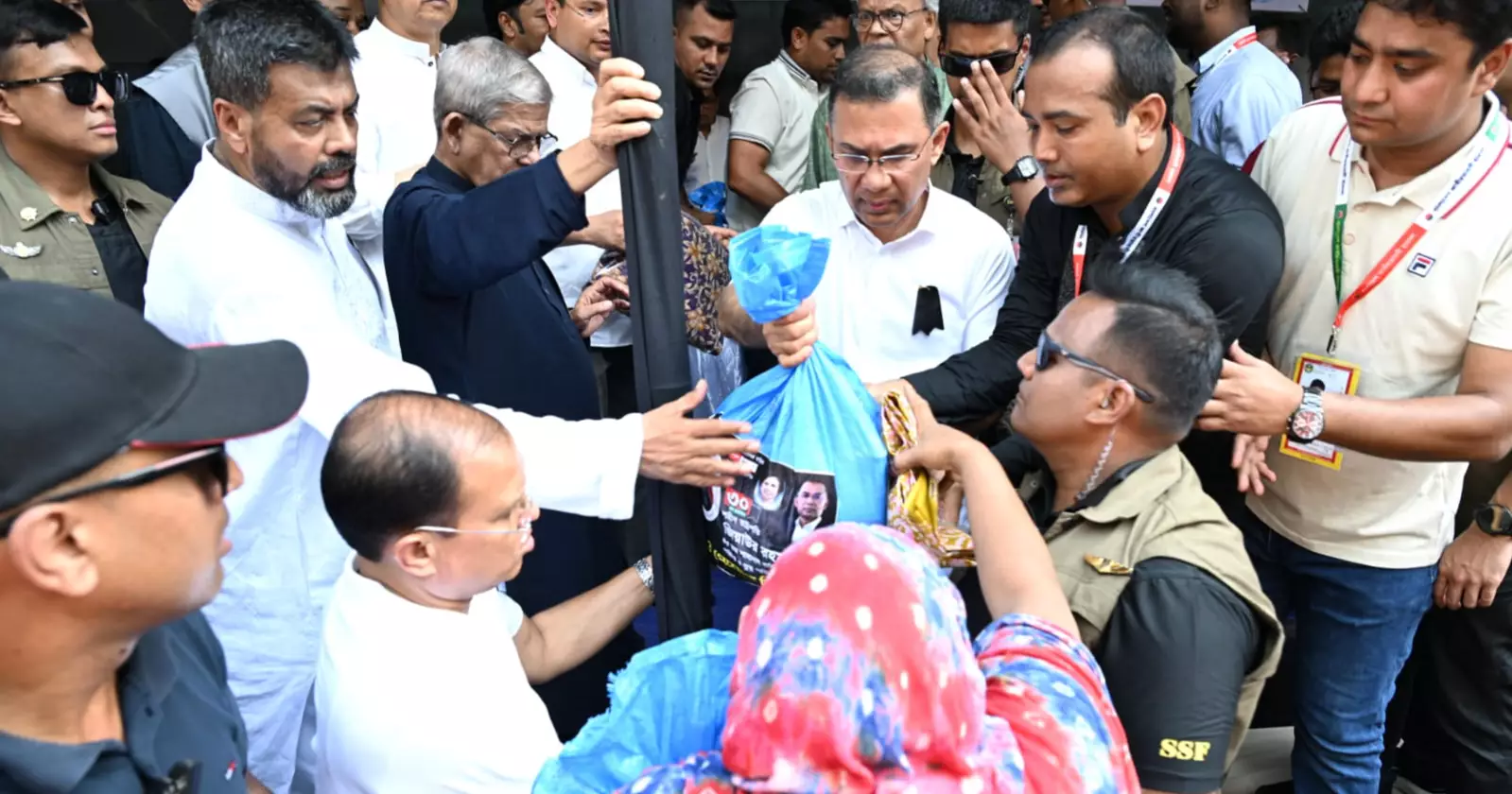 PM spends day with poor, distributes aid across Dhaka on Zia’s death anniversary